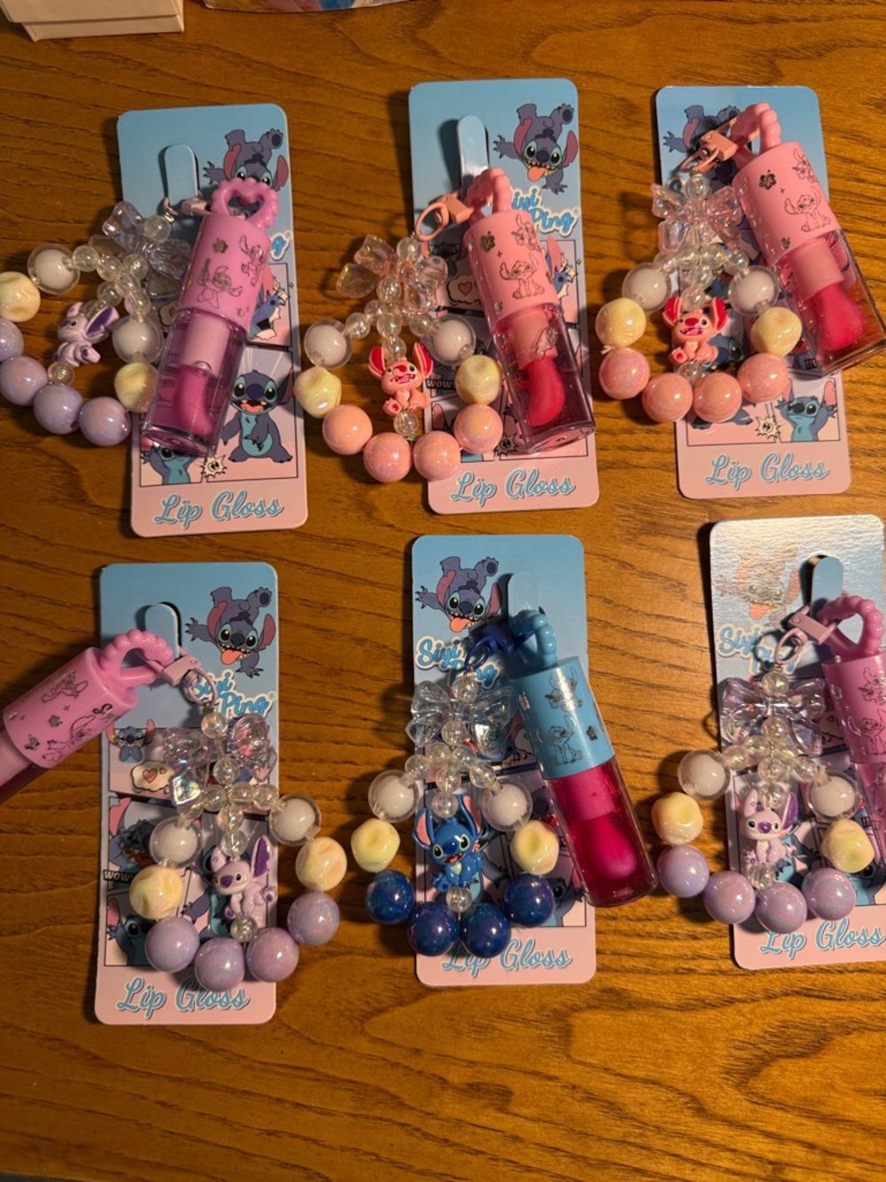 Cute Character Lip Gloss Set with Beaded Charm Bracelet - Pastel Pink & Blue